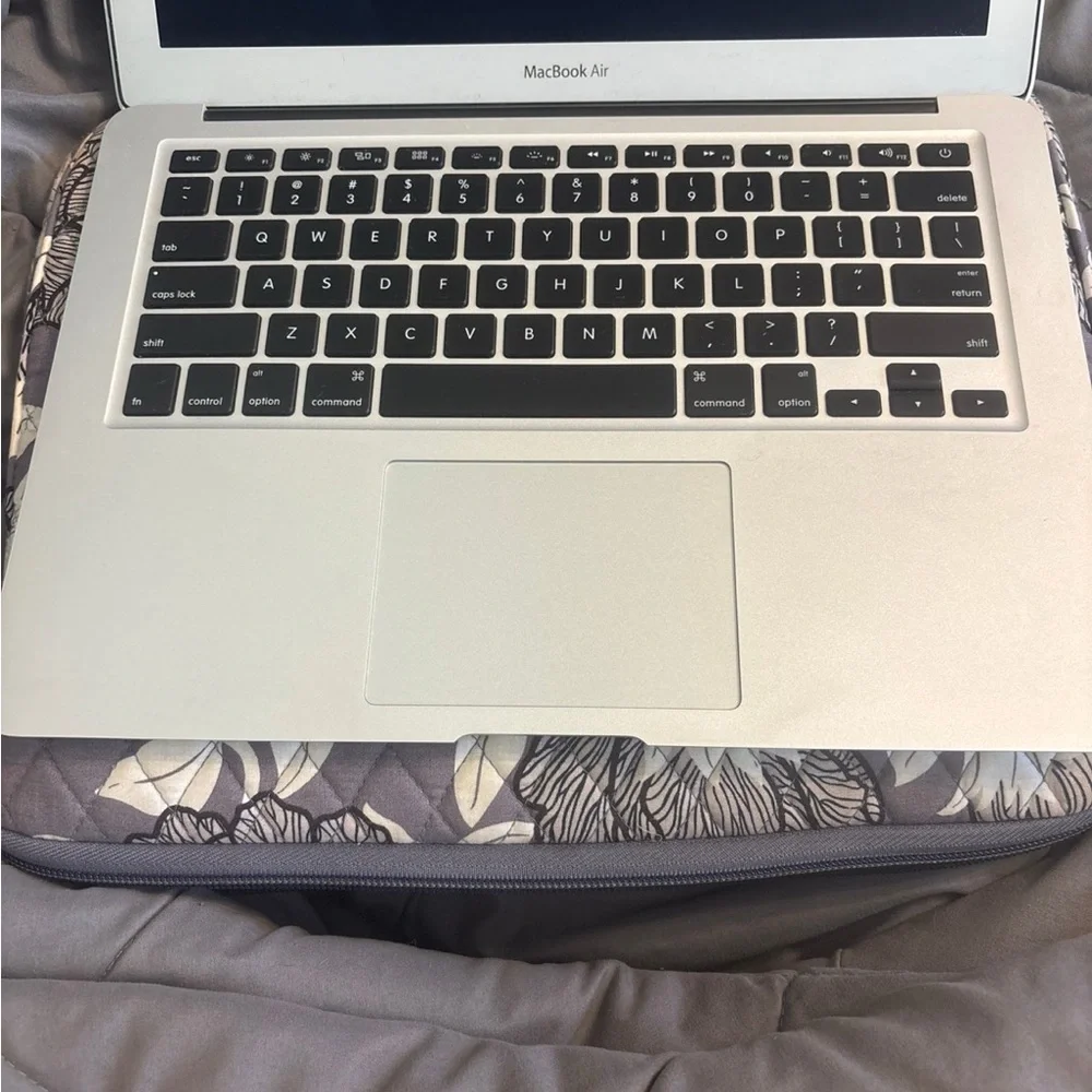 Apple Silver MacBook Laptop Sleek Design.